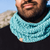 Ocean blue handcrafted Human Snood Scarf on a man with a beard.